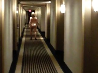 Bullseye reccomend wife walking through hotel hallways bikini