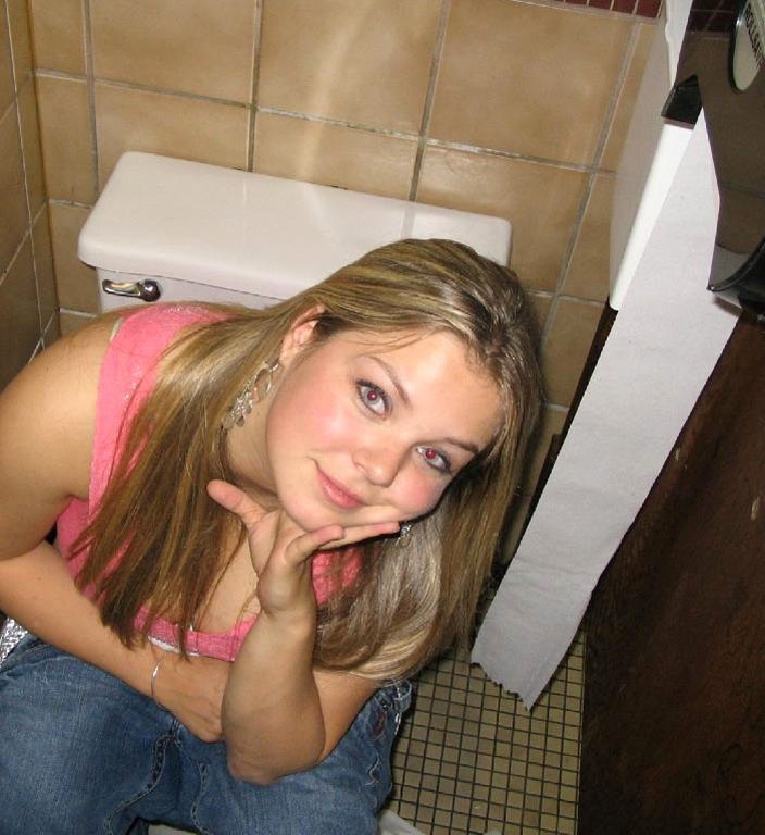 Woman caught peeing in the bathroom
